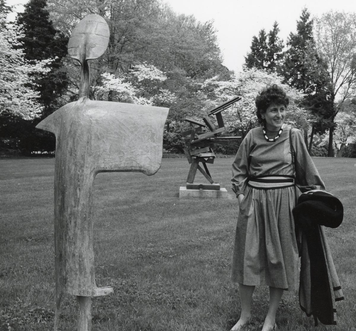 David Smith, <i>Personage of May</i>, 1957<br />
David Smith,&nbsp;<i>Becca</i>, 1964<br />
(installation view with Cynthia Hazen Polsky, <em>29 Sculptures from the Howard and Jean Lipman Collection</em> Opening, Storm King Art Center, 1986)