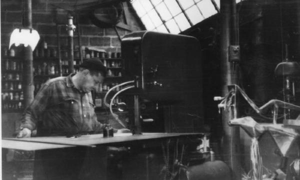 <em>Smith in studio, B.L., new machinery</em>, 1945